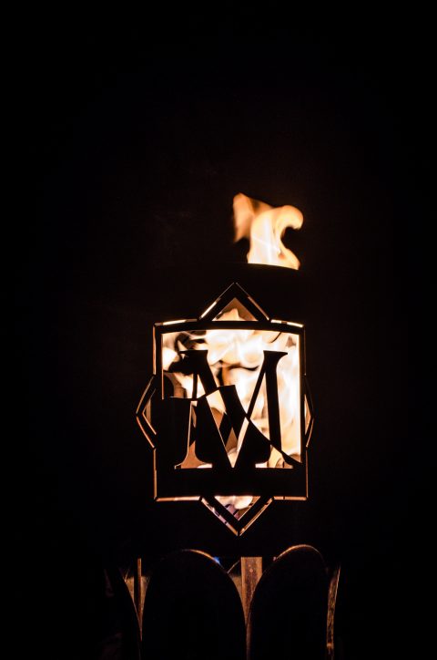 Lit festival torch fabricated by Bryan Tool for Massanutten Resort