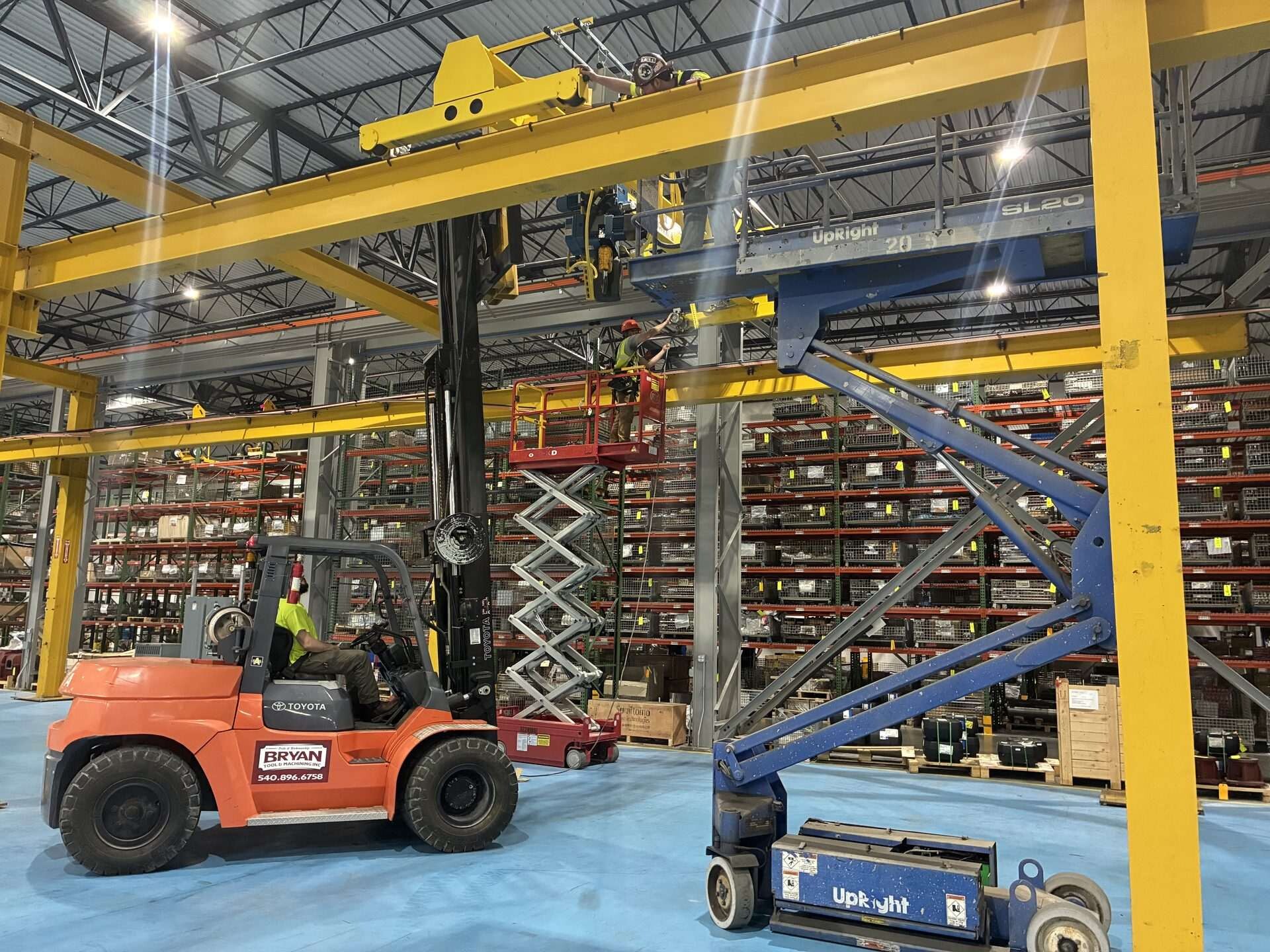 Structural steel installation inside a customer warehouse